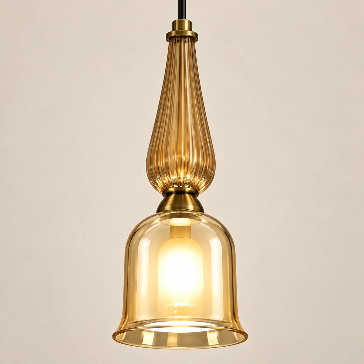 Close-up of the fluted amber glass neck and rounded lantern body