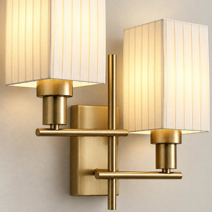 Close-up of the pleated shades, brass-tone sockets and offset arm connections