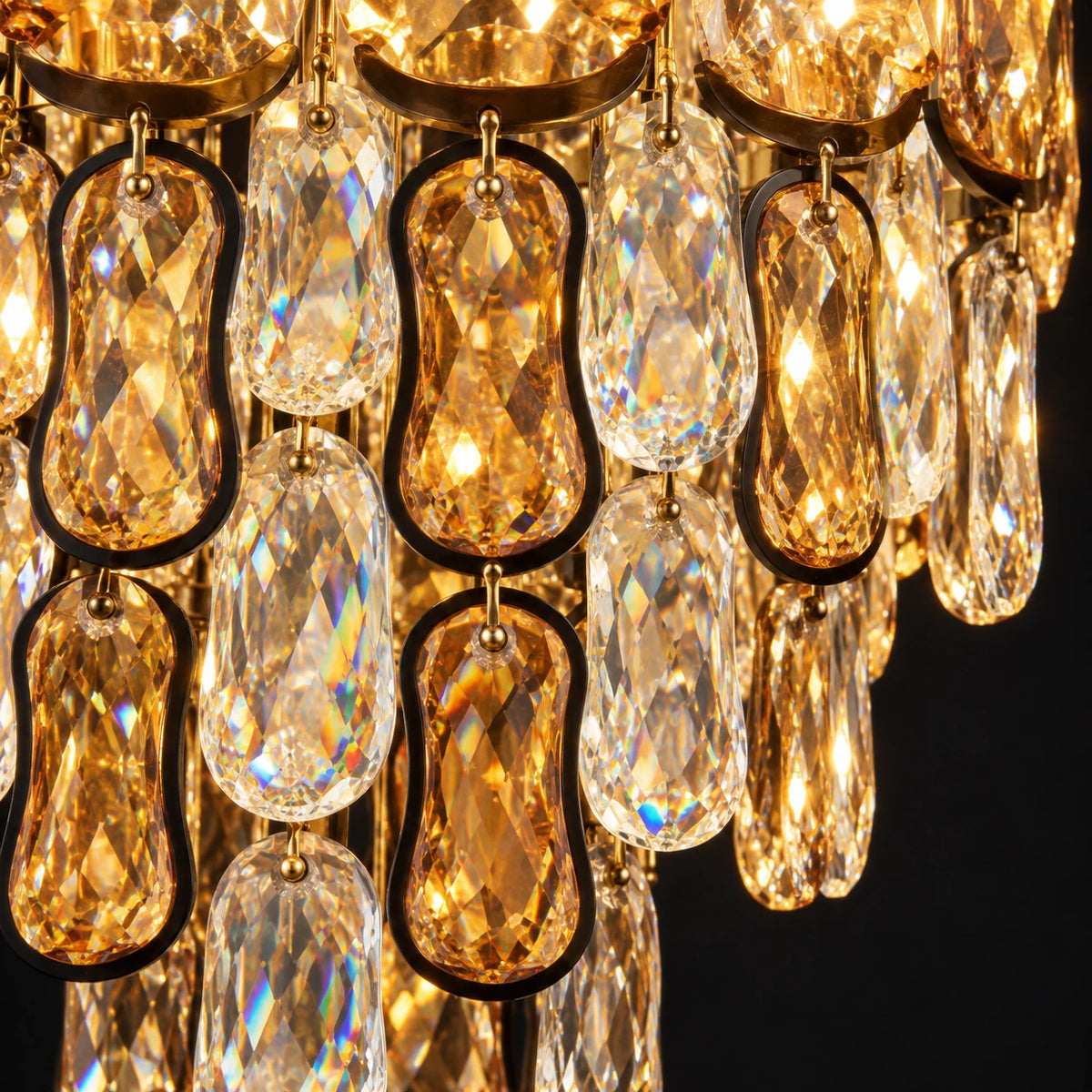 Close-up of clear and amber faceted chandelier drops