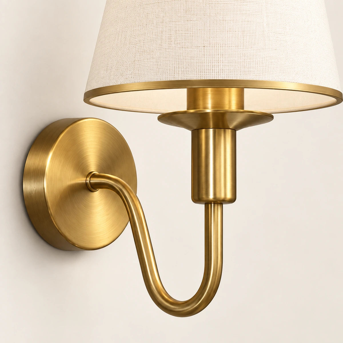 Close-up of the shade trim, holder, curved arm and round wall plate