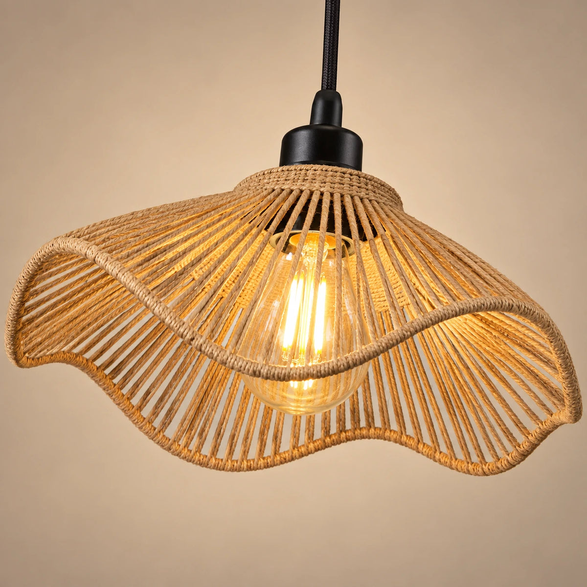 Close-up of the natural rope weave, wavy rim and black lampholder