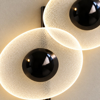 Close-up of the frosted oval diffusers and black central mounts