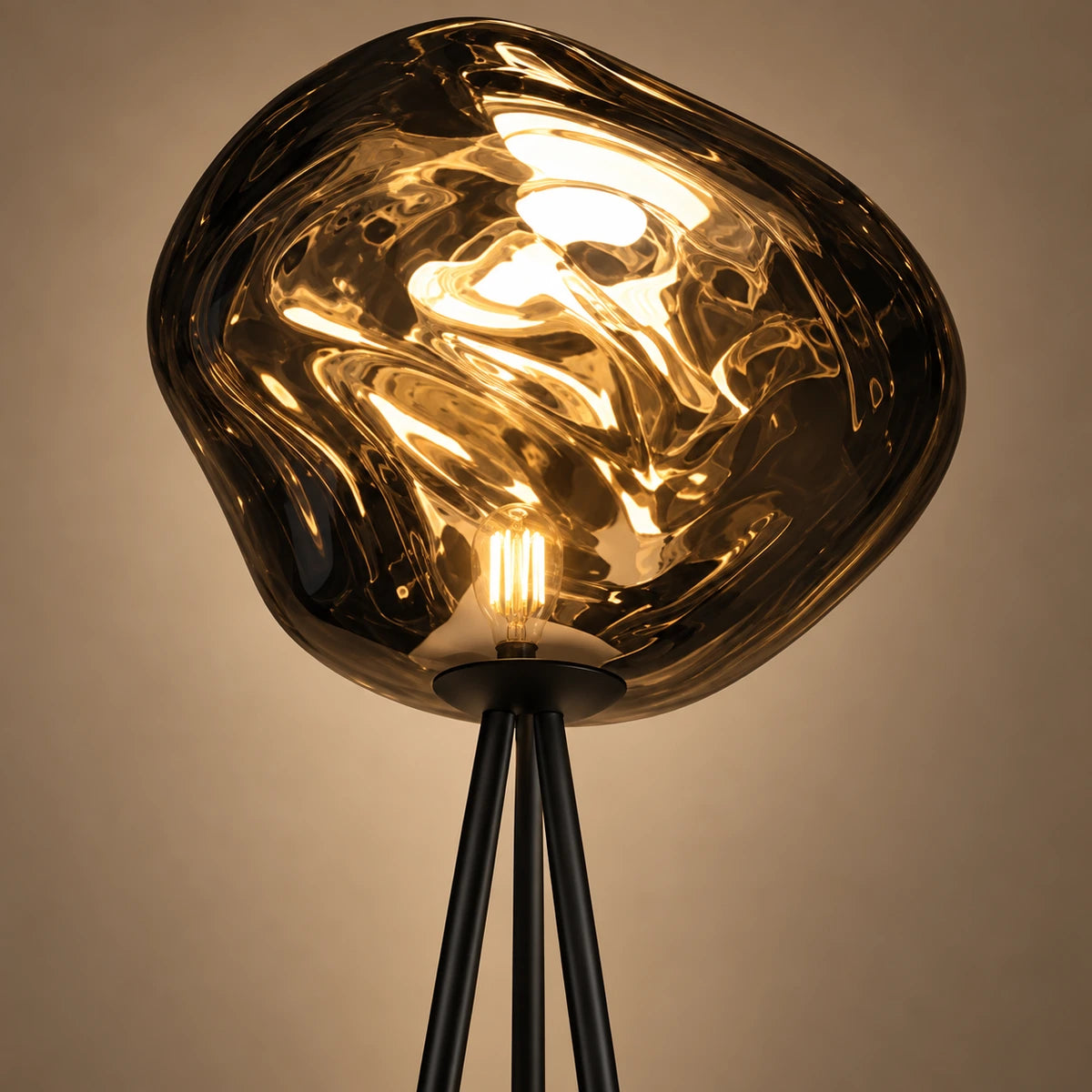 Close-up of the smoke acrylic globe, bulb, holder and tripod junction