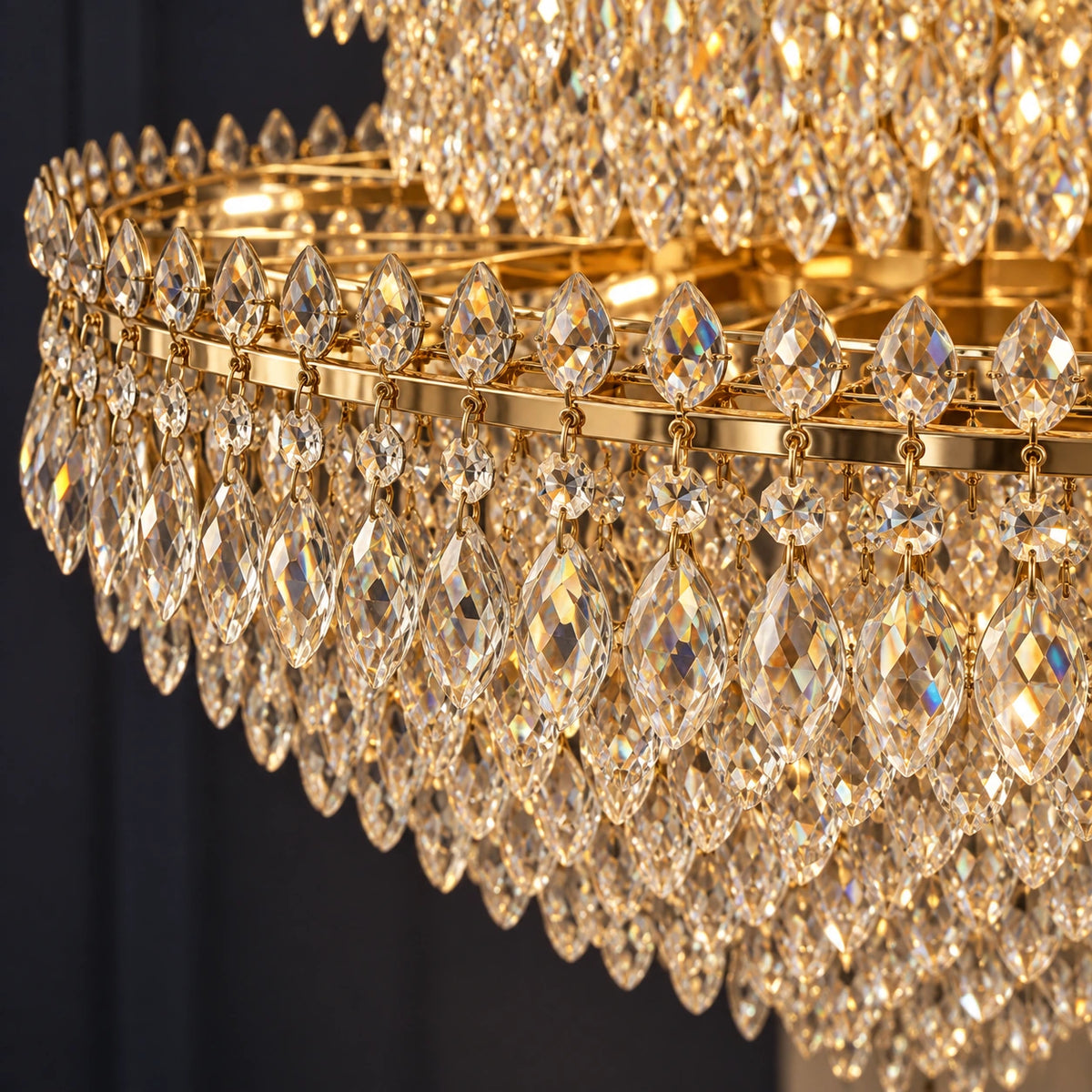 Close-up of faceted crystal drops and warm gold-tone frame