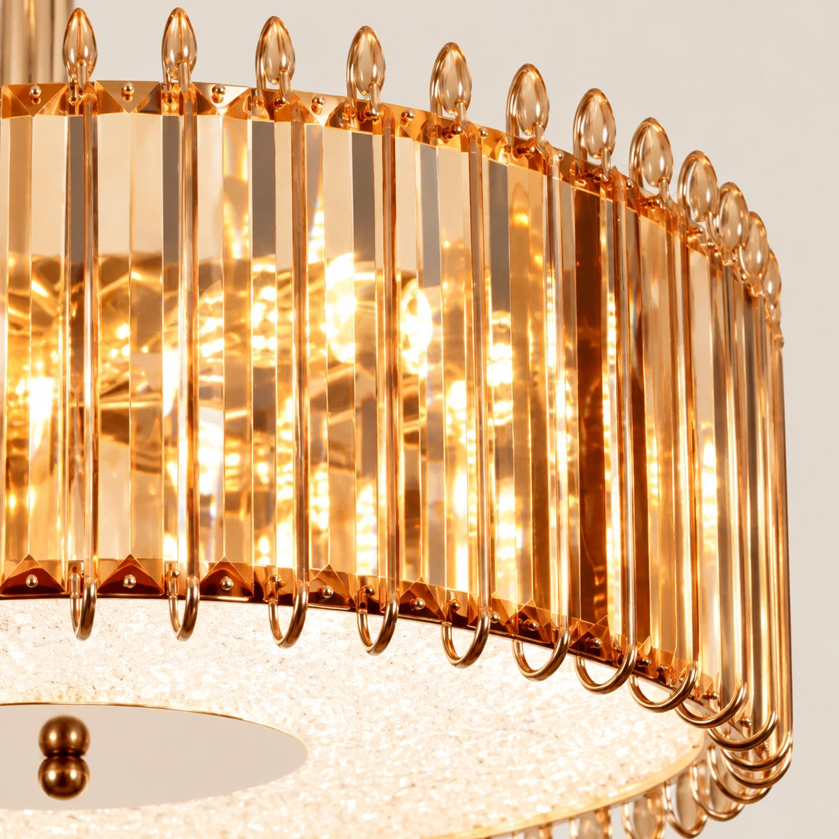 Close-up of amber crystal rods, gold frame and lower diffuser