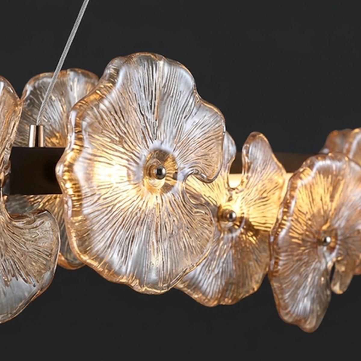 Close-up of the translucent flower-shaped glass details