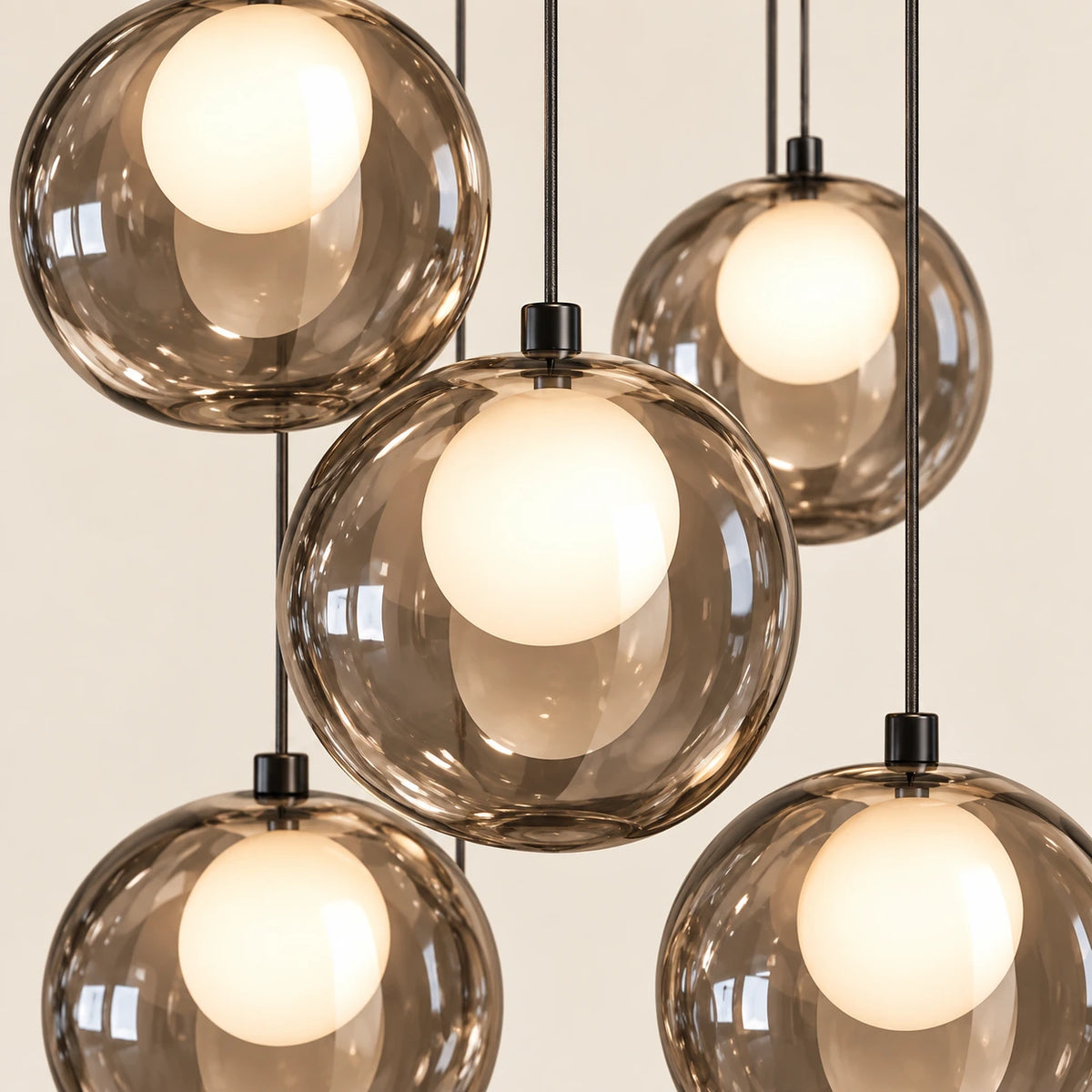 Close-up of the smoke glass globes, inner diffusers and suspension details