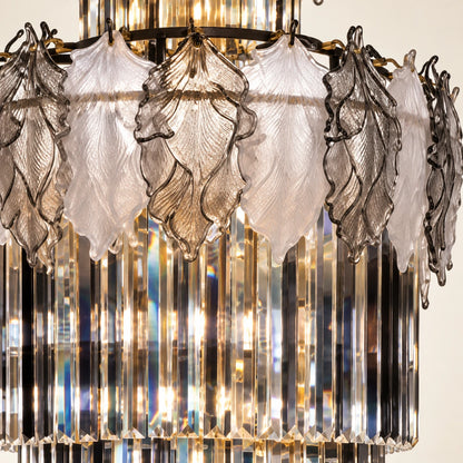 Close-up of the white and smoke glass leaves above alternating crystal prisms
