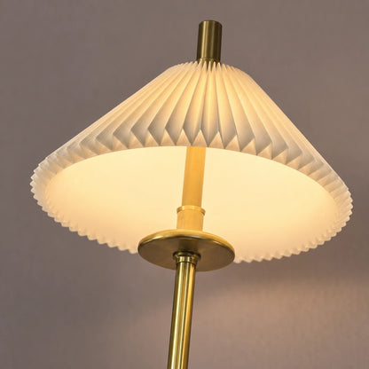 Close-up of the pleated shade, scalloped edge and antique-gold support detail