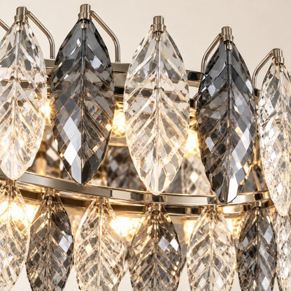 Close-up of the alternating clear and smoke crystal leaves and oval metal frame