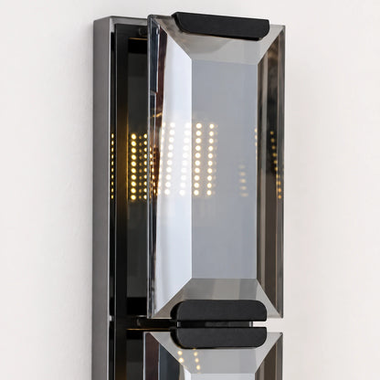 Close-up of the bevelled mirrored panel, smoked side frame and tier connector