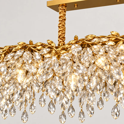 Close-up of the suspension, gold-tone frame and faceted crystal drops