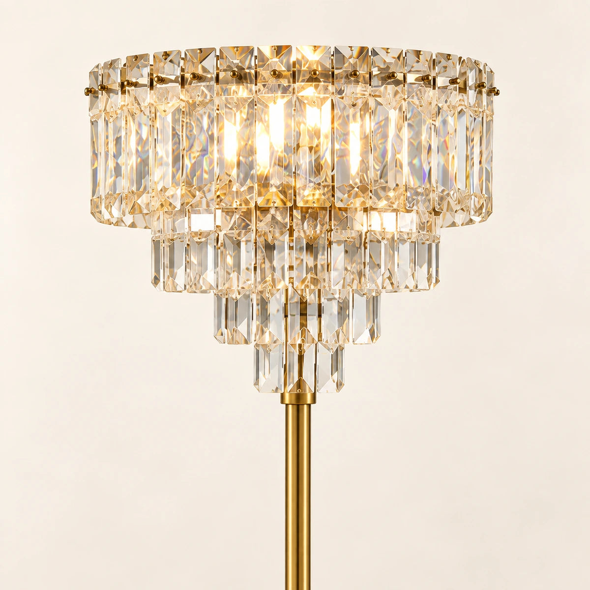 Close-up of the tiered clear accents and gold-tone stem connection