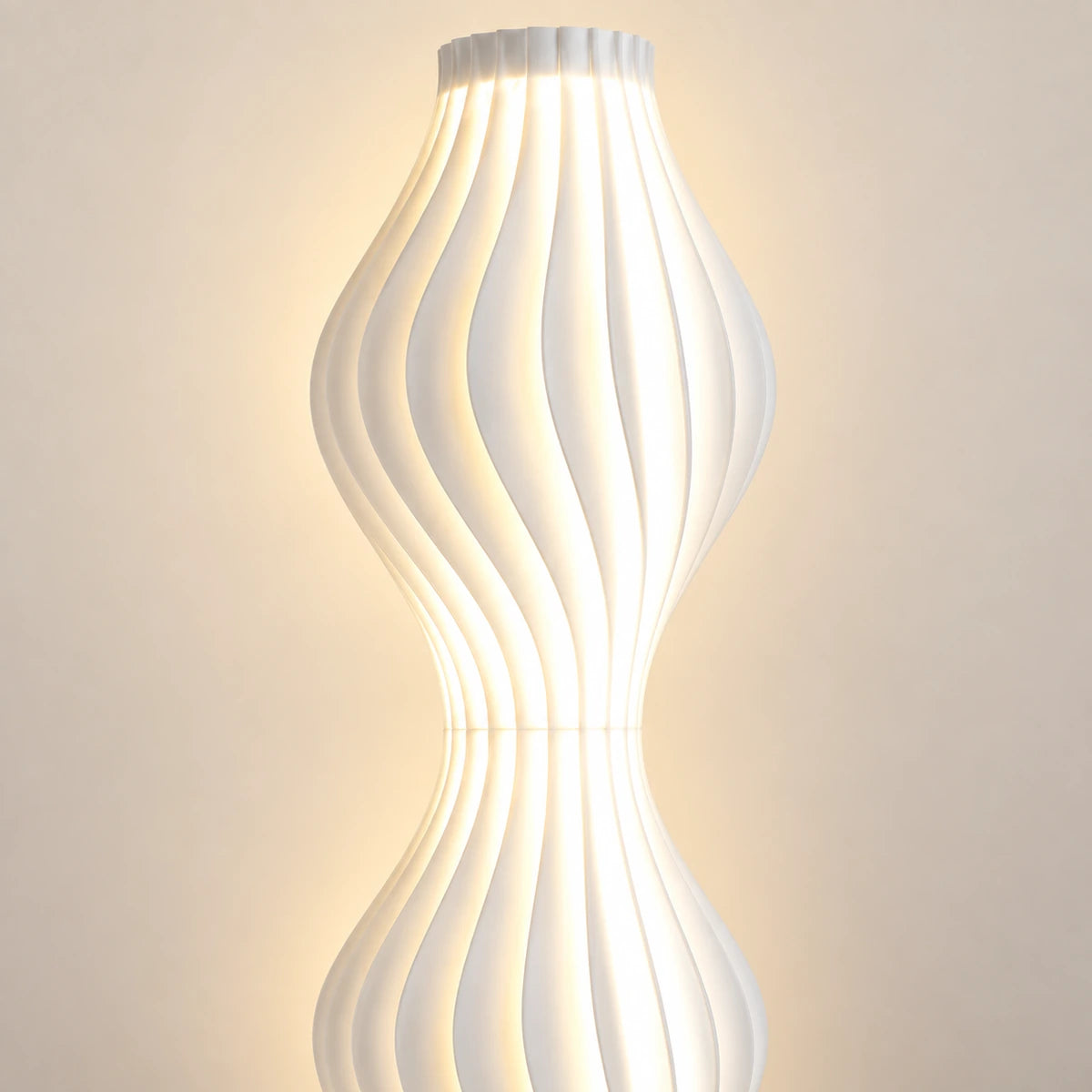 Close-up of the illuminated vertical ribs and pinched waist