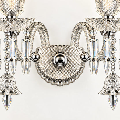 Close-up of the central textured plate, mirrored arms and crystal fringes