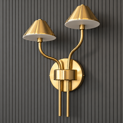 Close-up of the Auric wall light's two tapered shades, asymmetric curved arms, round plate and lower tails