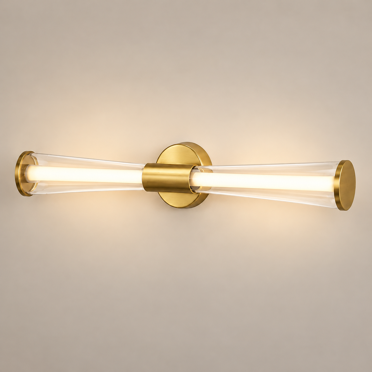 Close-up of the Elara mirror light's clear tapered tubes, internal diffusers, gold centre and end caps