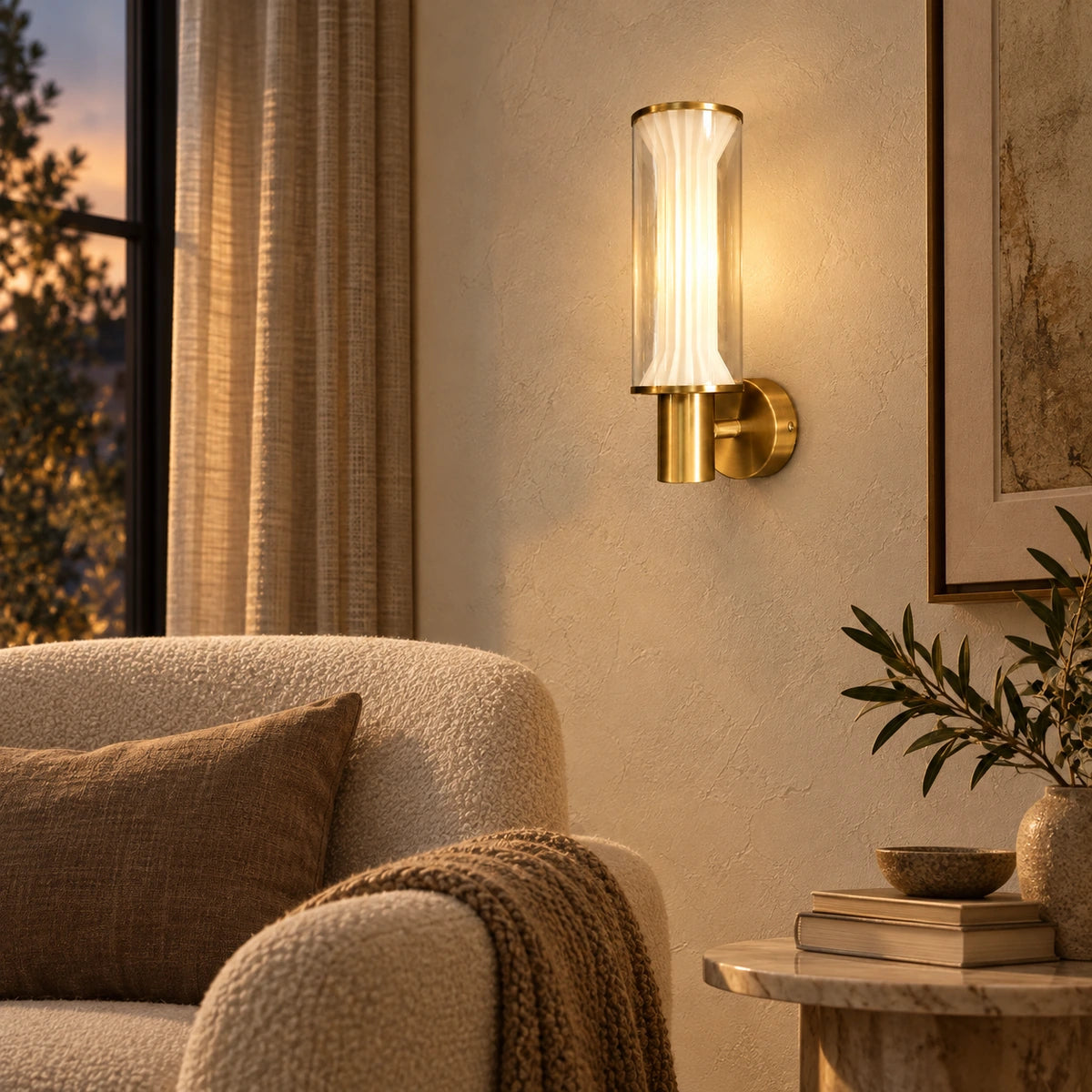 Fluted glass and gold wall light in a contemporary living room