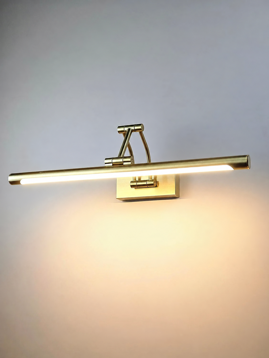Gold articulated mirror light illuminated — source photo edited to remove supplier watermark