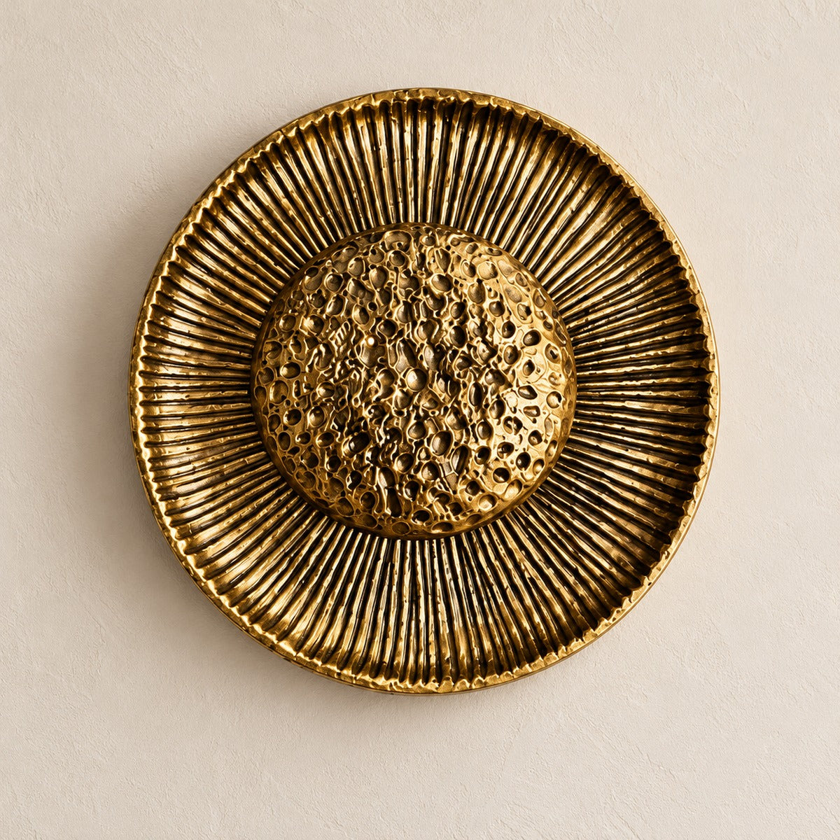 Gold sunburst wall light front view