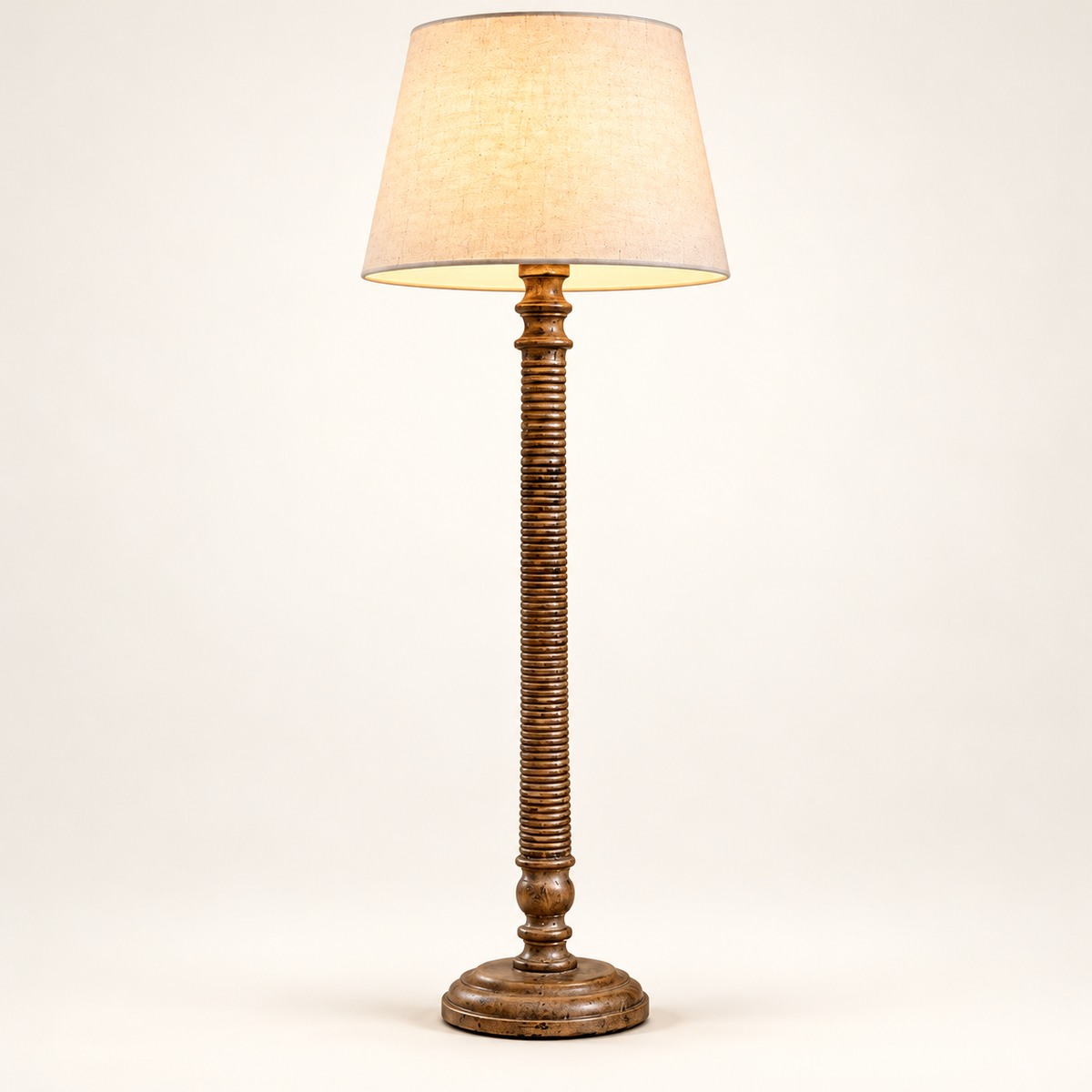 Lustrella bronze-brown ribbed column floor lamp on a clean warm-white background