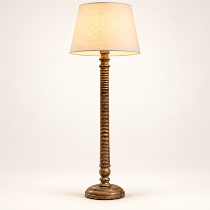 Lustrella bronze-brown ribbed column floor lamp on a clean warm-white background
