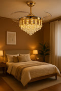 Crystal-drop retractable-blade fan chandelier in a bedroom