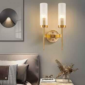 Historical supplier image of L6287-2 twin-cylinder wall sconce with round wall plate; low-resolution reference, dimensions unverified