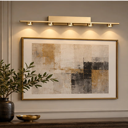 Five-light picture light above artwork