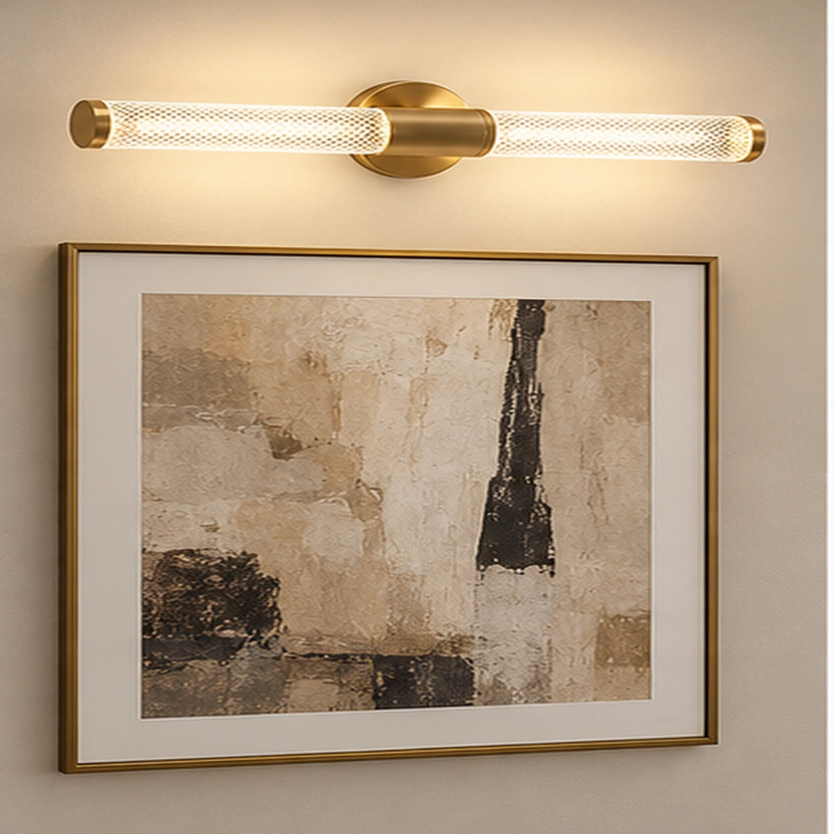 Textured cylinder mirror light above artwork