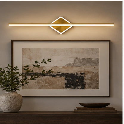 Geometric linear wall light above artwork