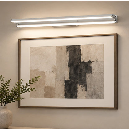 Adjustable mirror light above artwork