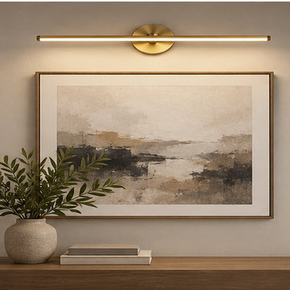 Round-mount linear mirror light above artwork