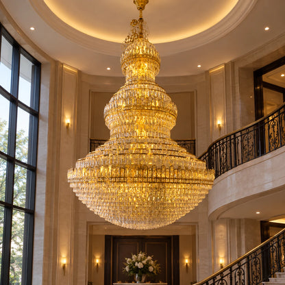 Grand tiered dome crystal chandelier in an entrance atrium
