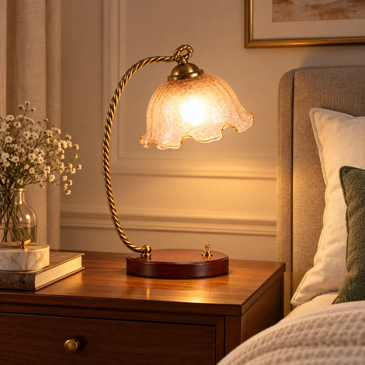Amber tulip table lamp on a contemporary bedside table
