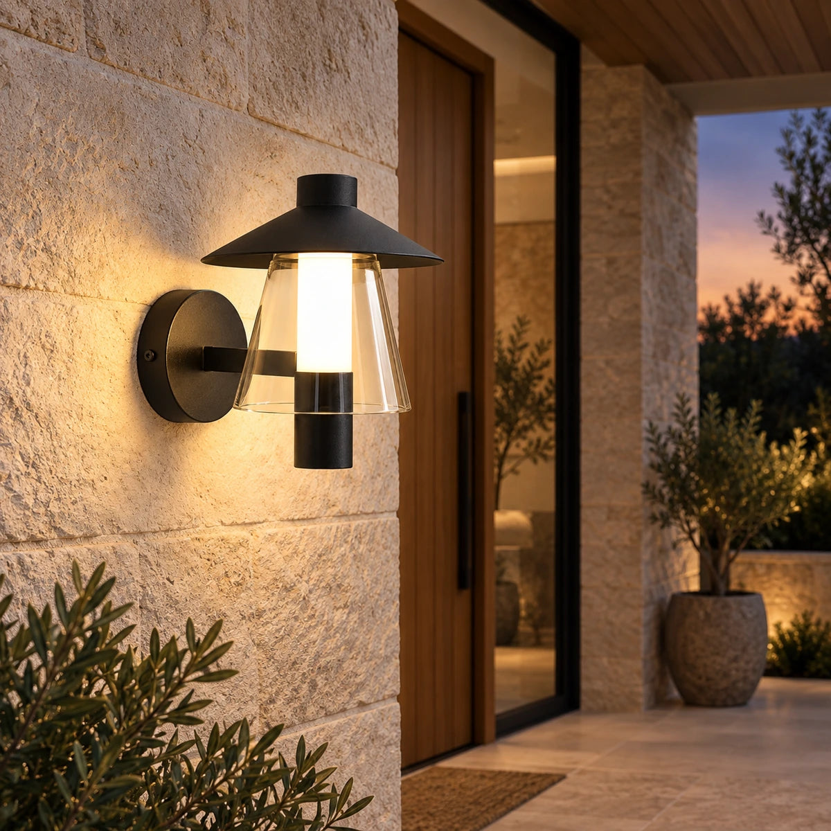Hooded wall light beside a covered patio entry