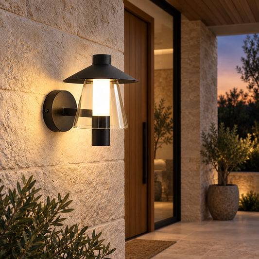 Hooded wall light beside a covered patio entry