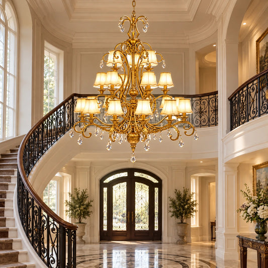 Scroll-arm three-tier chandelier in a curved-stair foyer