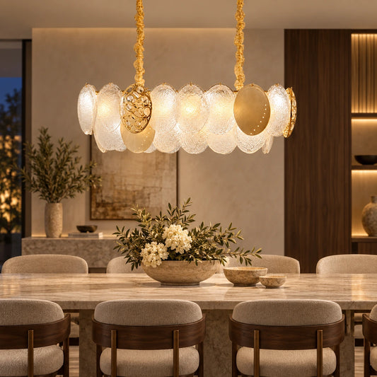 Frosted-disc linear pendant above a dining table