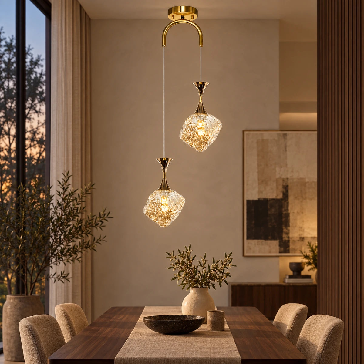 Textured-glass two-light pendant in a dining room
