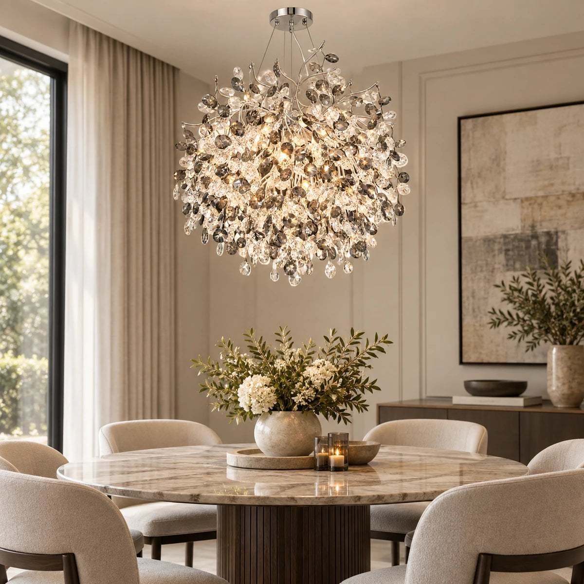 Silver botanical crystal chandelier above a dining table