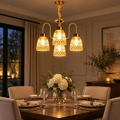 Four-light amber patterned-glass chandelier above a dining table
