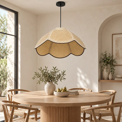Off-white woven dome pendant above a dining table