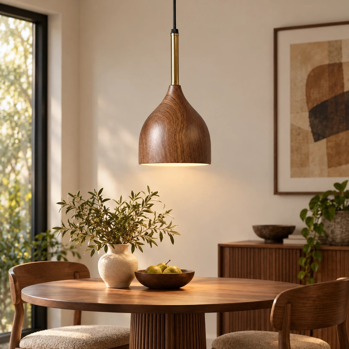 Wood-grain teardrop pendant above a dining table