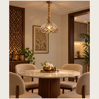 Faceted cage pendant above a dining table
