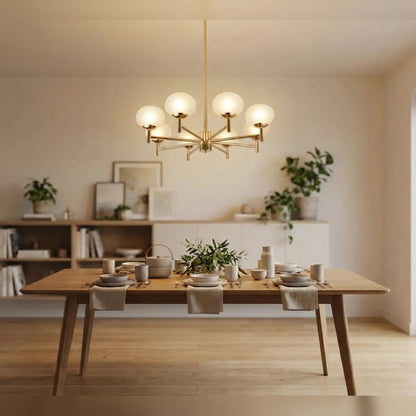 Eight-globe gold-toned chandelier in a bright dining room
