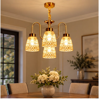 Four-light amber chandelier above a dining table