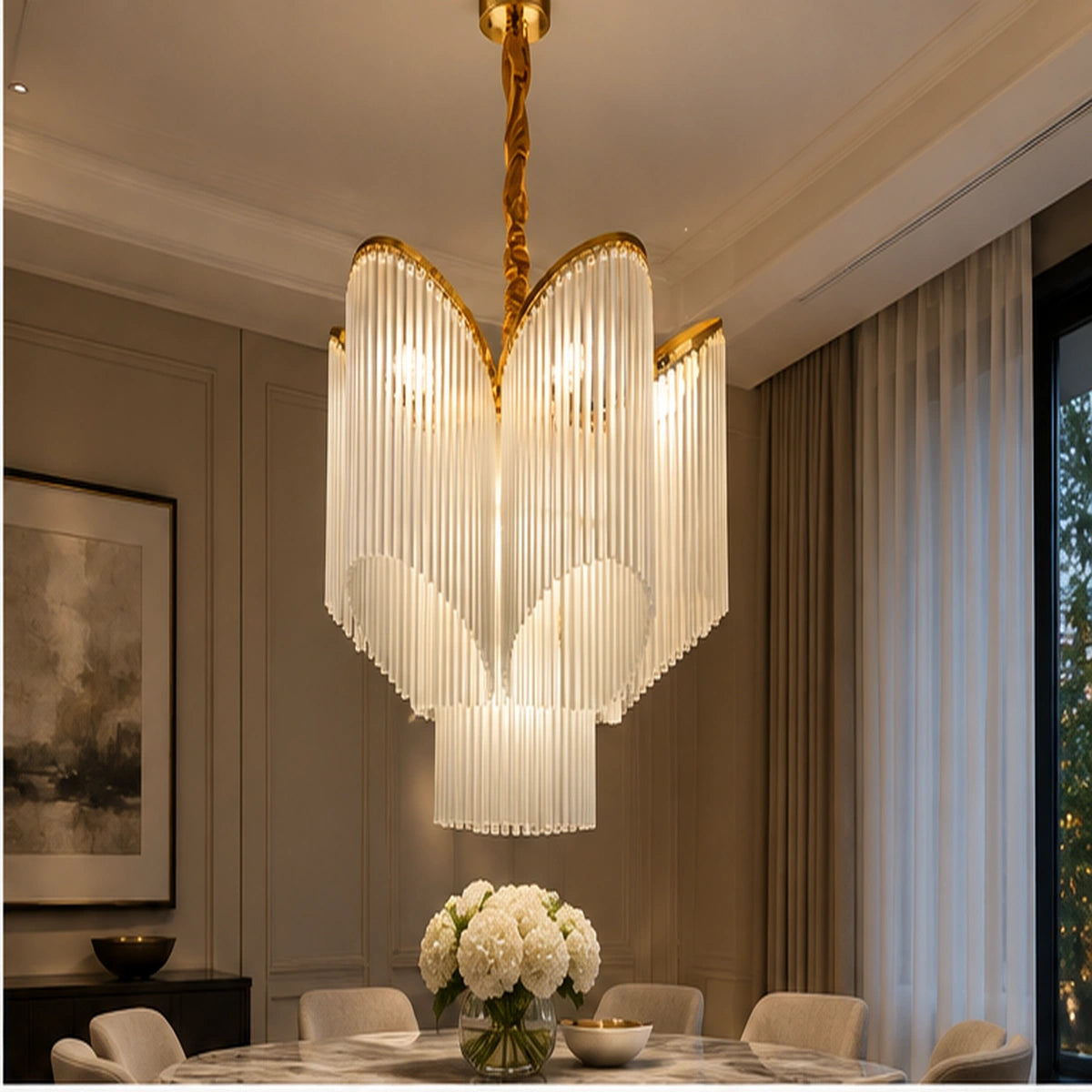 White glass fringe chandelier above a dining table