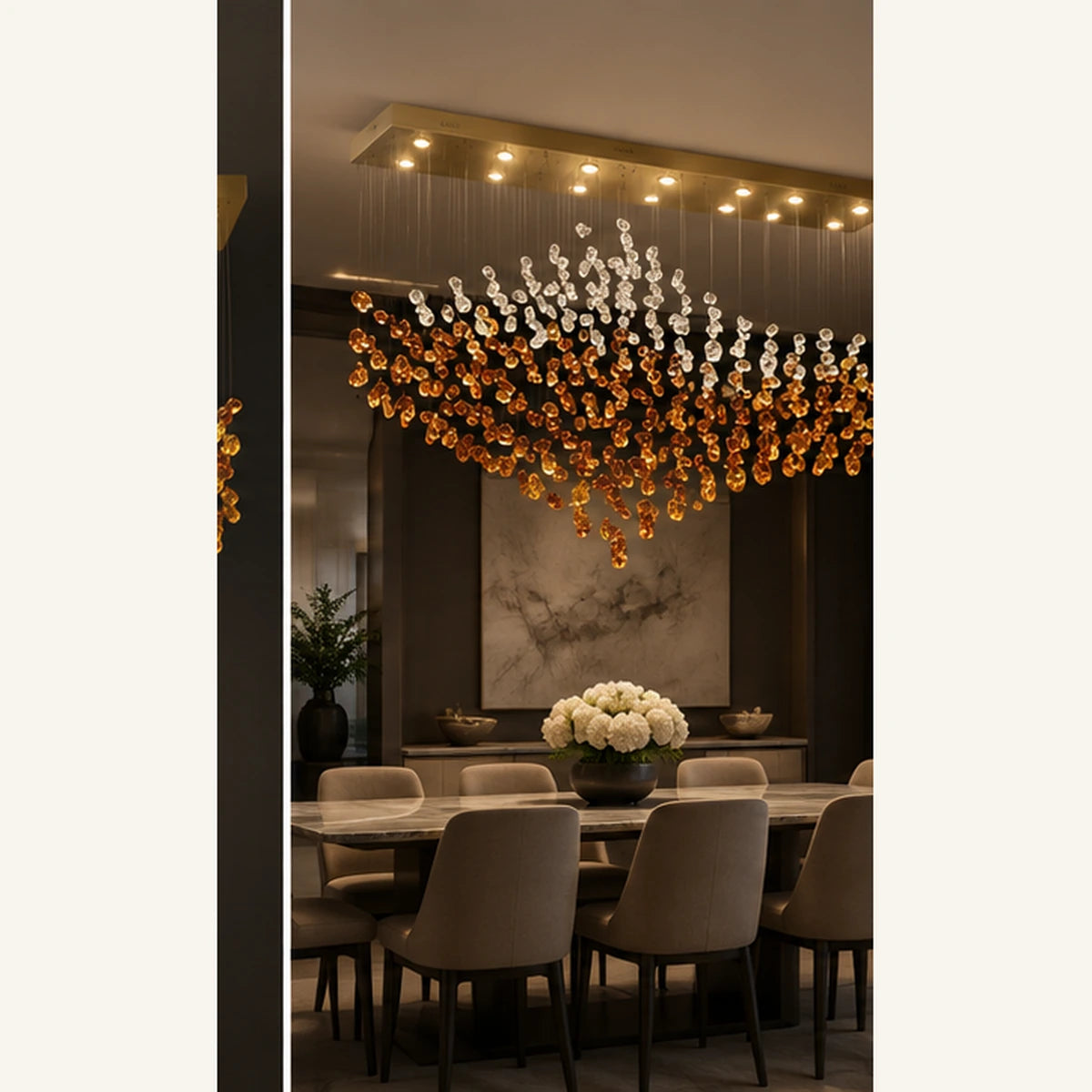 Crystal wave linear chandelier above a dining table