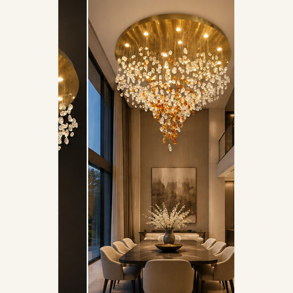 Glass cascade chandelier in a double-height dining room